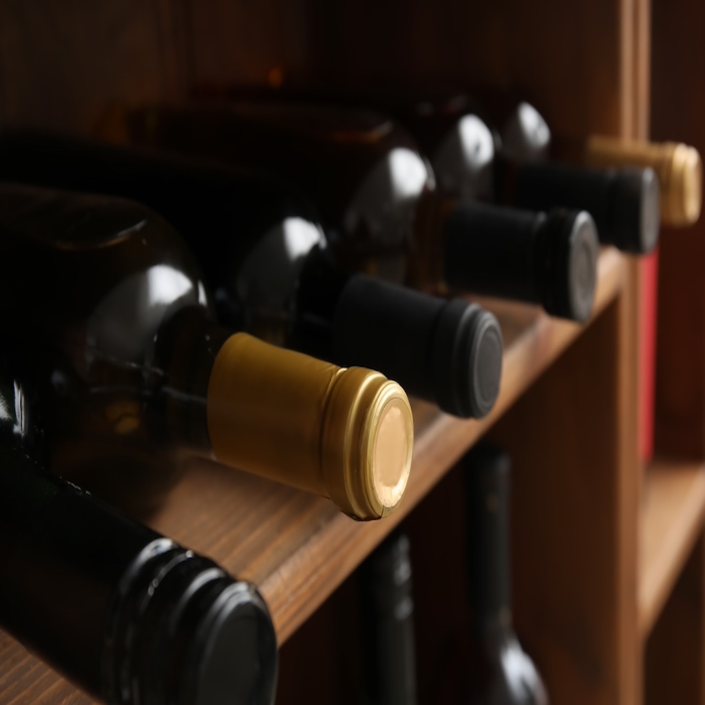 Wooden,Storage,Stand,With,Bottles,Of,Wine
